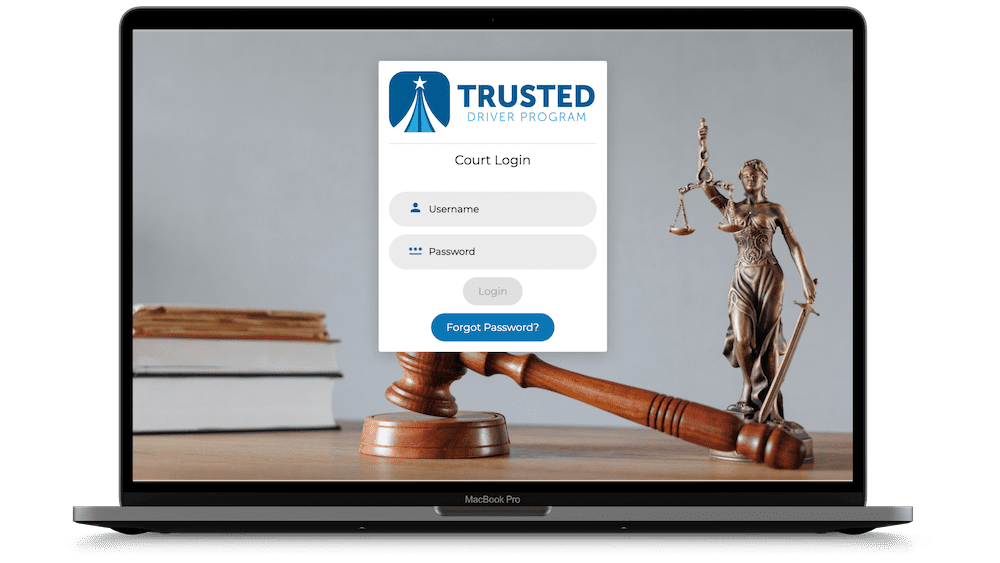 desktop with login screen to trusted driver