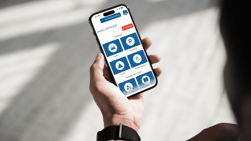 Person holding phone with TD app